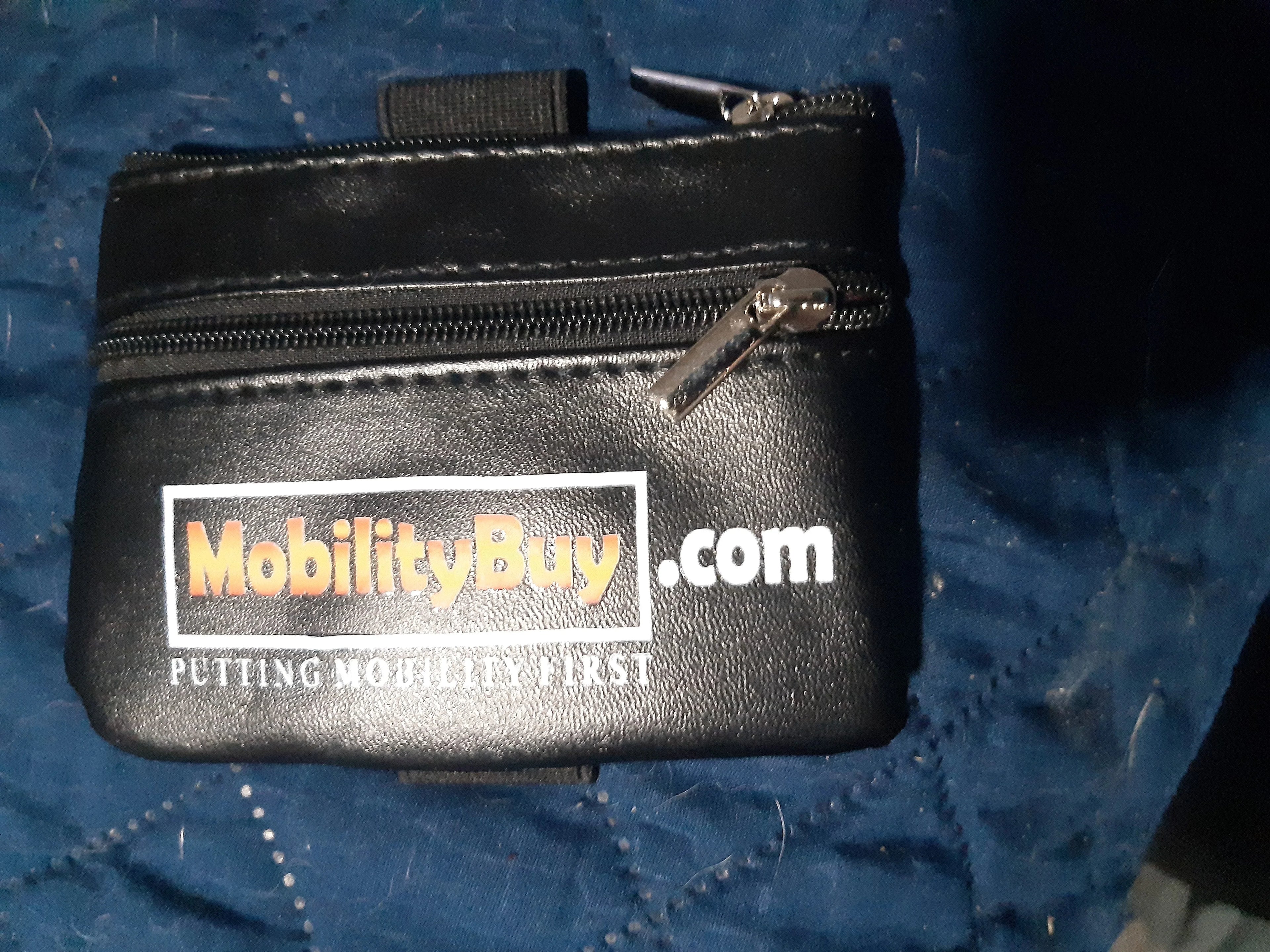 Easy access wrist purse by MobilityBuy, designed for secure storage of cards, cash, and keys, ideal for disability use.