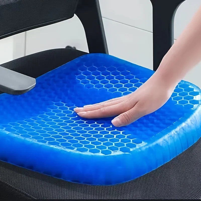 Water-resistant gel seat cushion with breathable honeycomb design for wheelchair comfort and support.