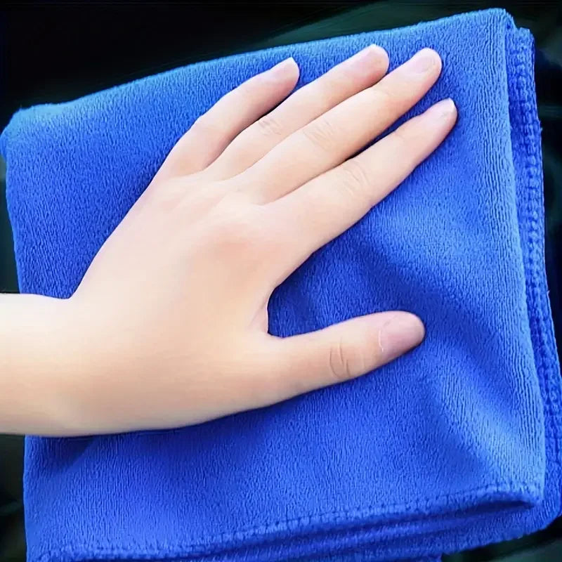 Soft microfiber towels in various colors, perfect for all-purpose drying and cleaning tasks.
