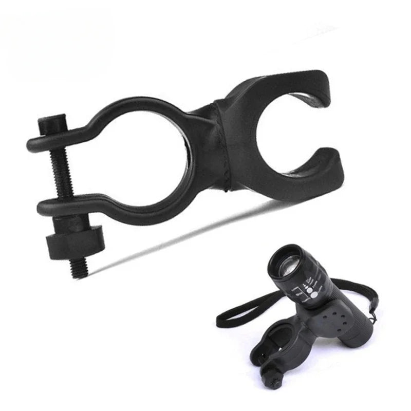 360-degree LED flashlight mount holder attached to a bicycle handlebar, designed for walking sticks by MobilityBuy.com.