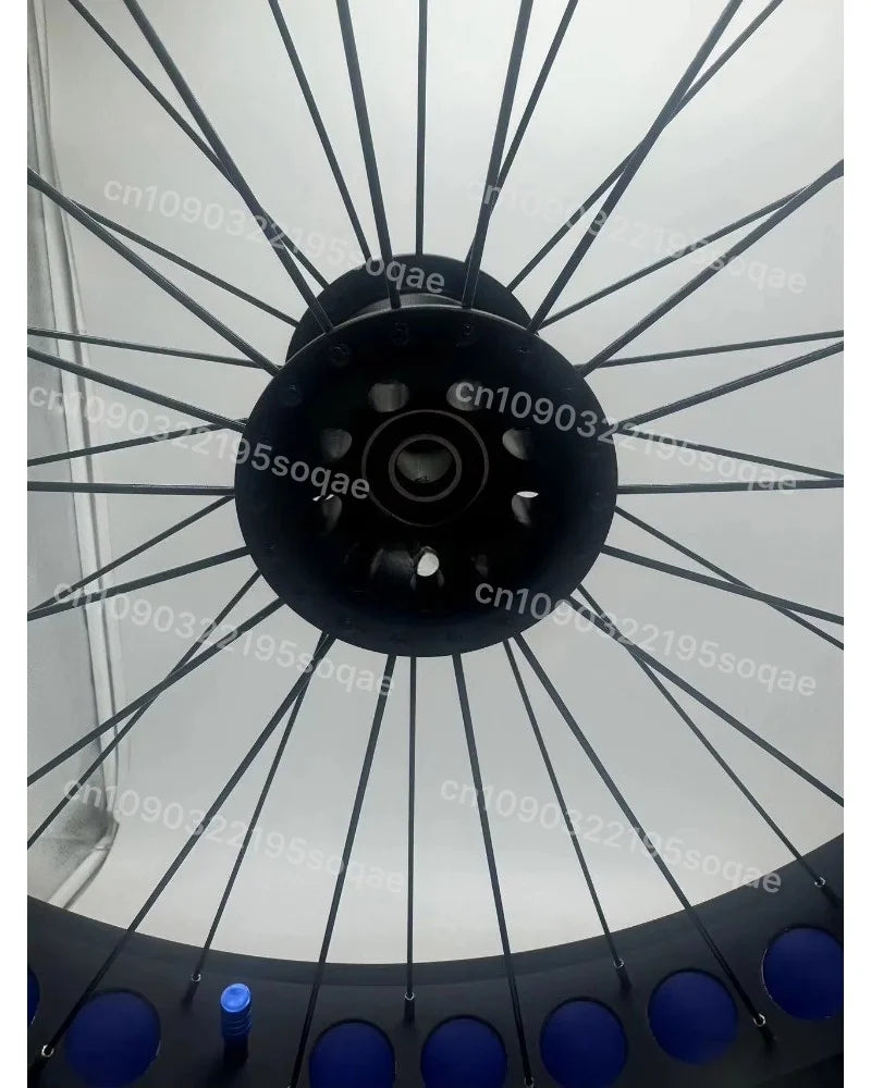 24-inch fat-tire wheelchair wheel with black hub and spokes for outdoor mobility