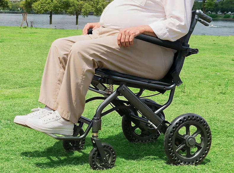 Small foldable, lightweight wheelchair - travel, portable trolley for airplanes - MobilityBuy.com