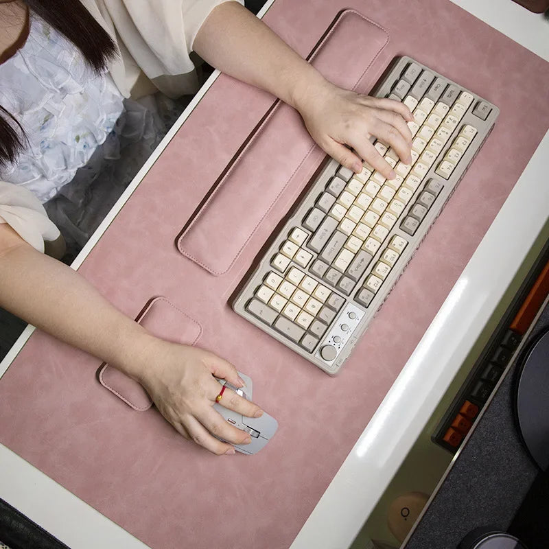 Pink PU three-piece desk mat set with wrist rest for keyboard and mouse; non-slip waterproof.