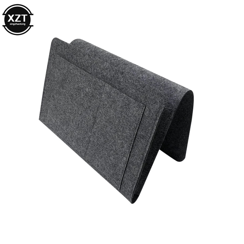 Felt bedside storage organizer with pockets in dark gray; hanging bed/sofa pocket (XZT logo)
