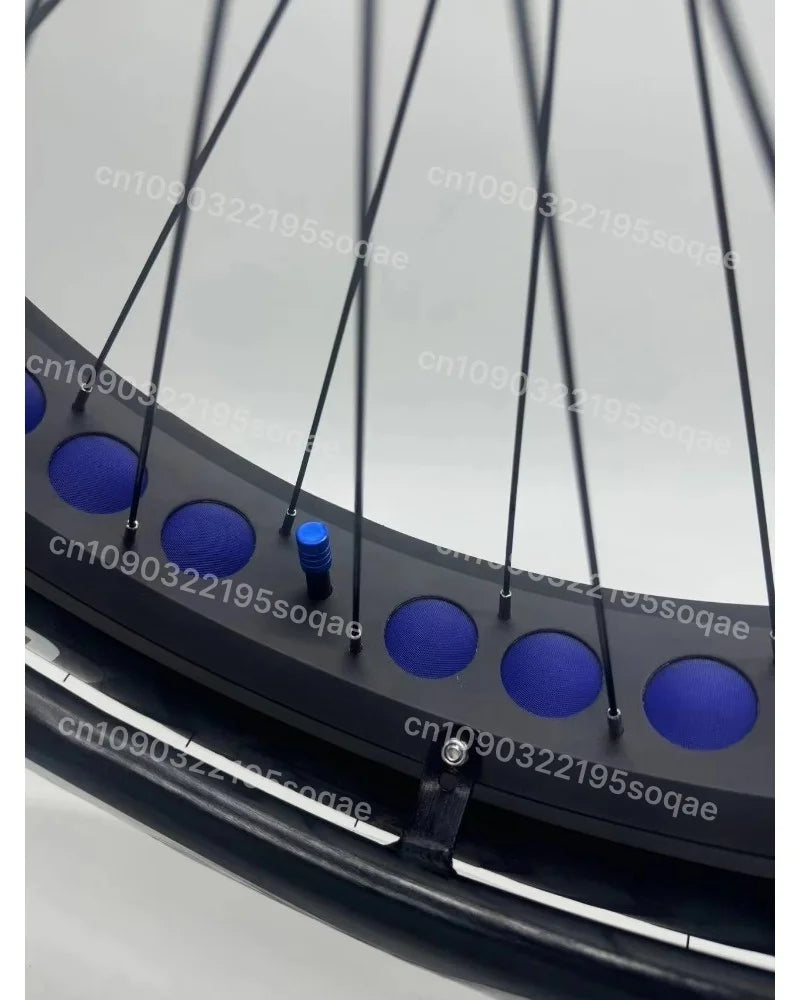 Wheelchair wheel, 24 inch x 4.0 fat tire, with blue valve stem and blue rim caps