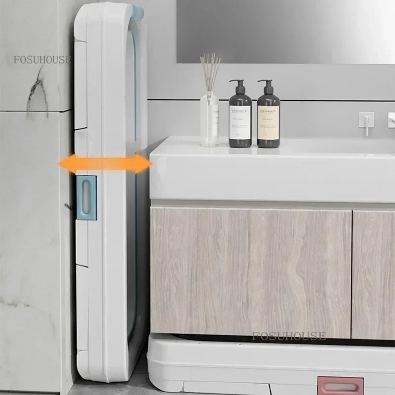 Portable folding bathtub for adults MobilityBuy.com, white plastic tub with blue side latch.