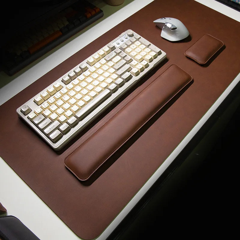Brown PU desk mat set with large mouse pad, long wrist rest, and two small pads.