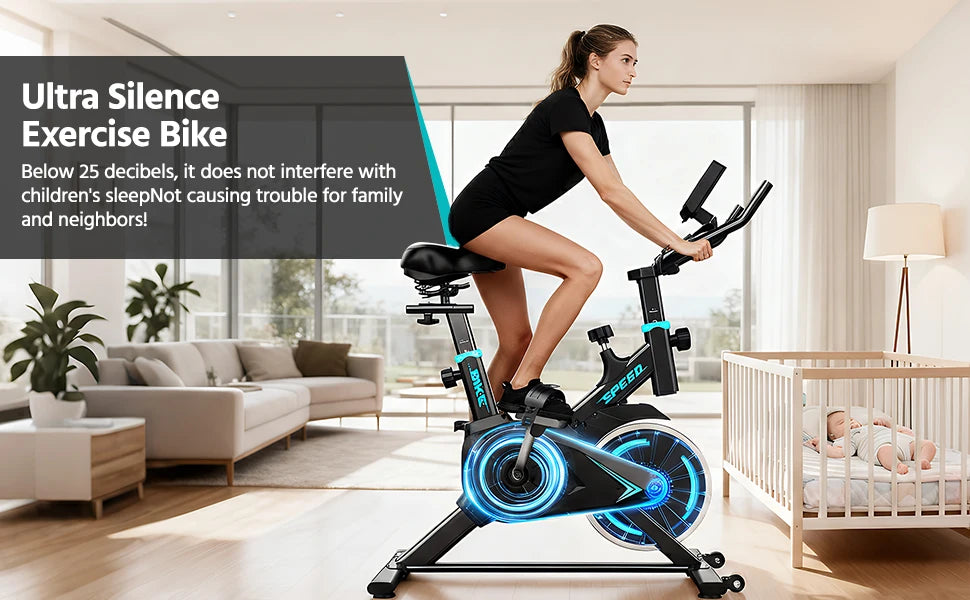 MobilityBuy.com Upright spin exercise bike with black frame and blue-lit flywheel in a home living room.