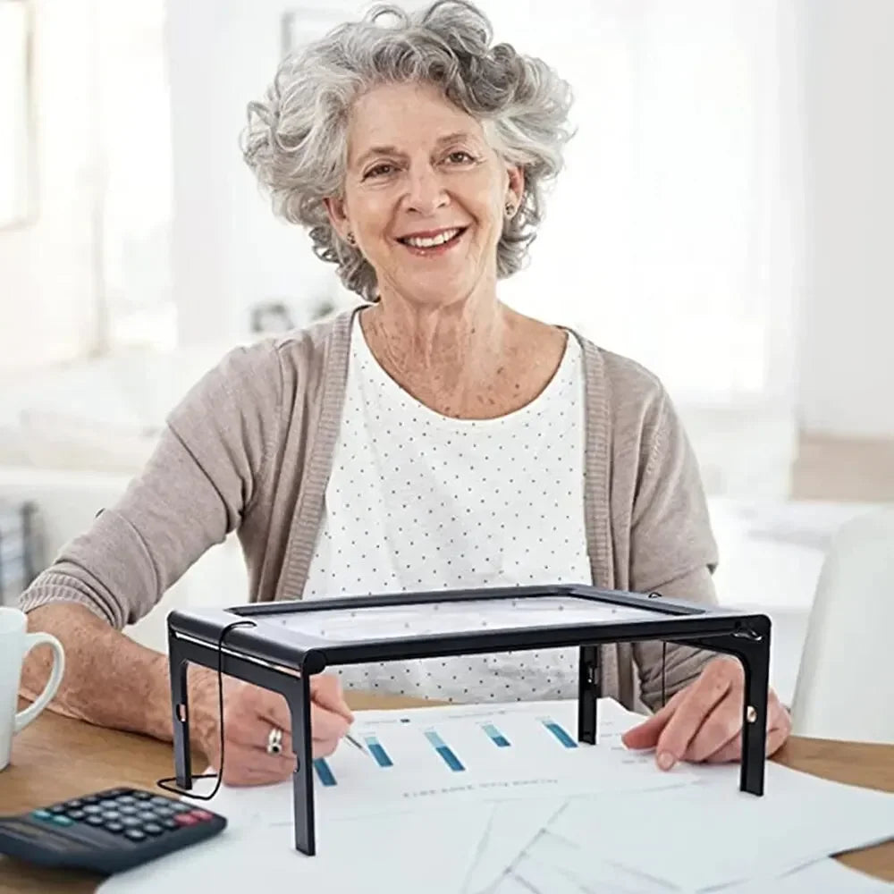 Hands-free LED magnifier with detachable stand, featuring 5 modes for enhanced visibility, ideal for large print viewing.