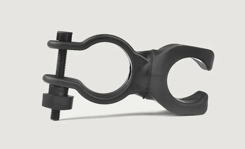 360 Degree Bicycle LED Flashlight Mount Holder attached to a walking stick, showcasing its sturdy design and versatility.