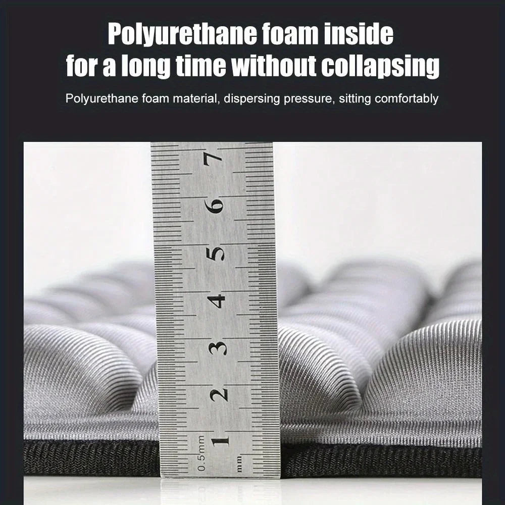 Portable anti-slip pressure relief cushion, breathable mat for sedentary comfort, featuring ergonomic design and soft texture.
