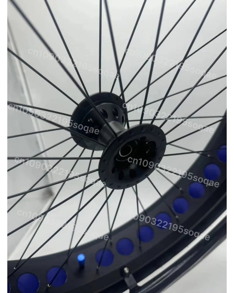 24 inch fat-tire wheelchair wheel with black hub and blue rim accents for outdoor mobility