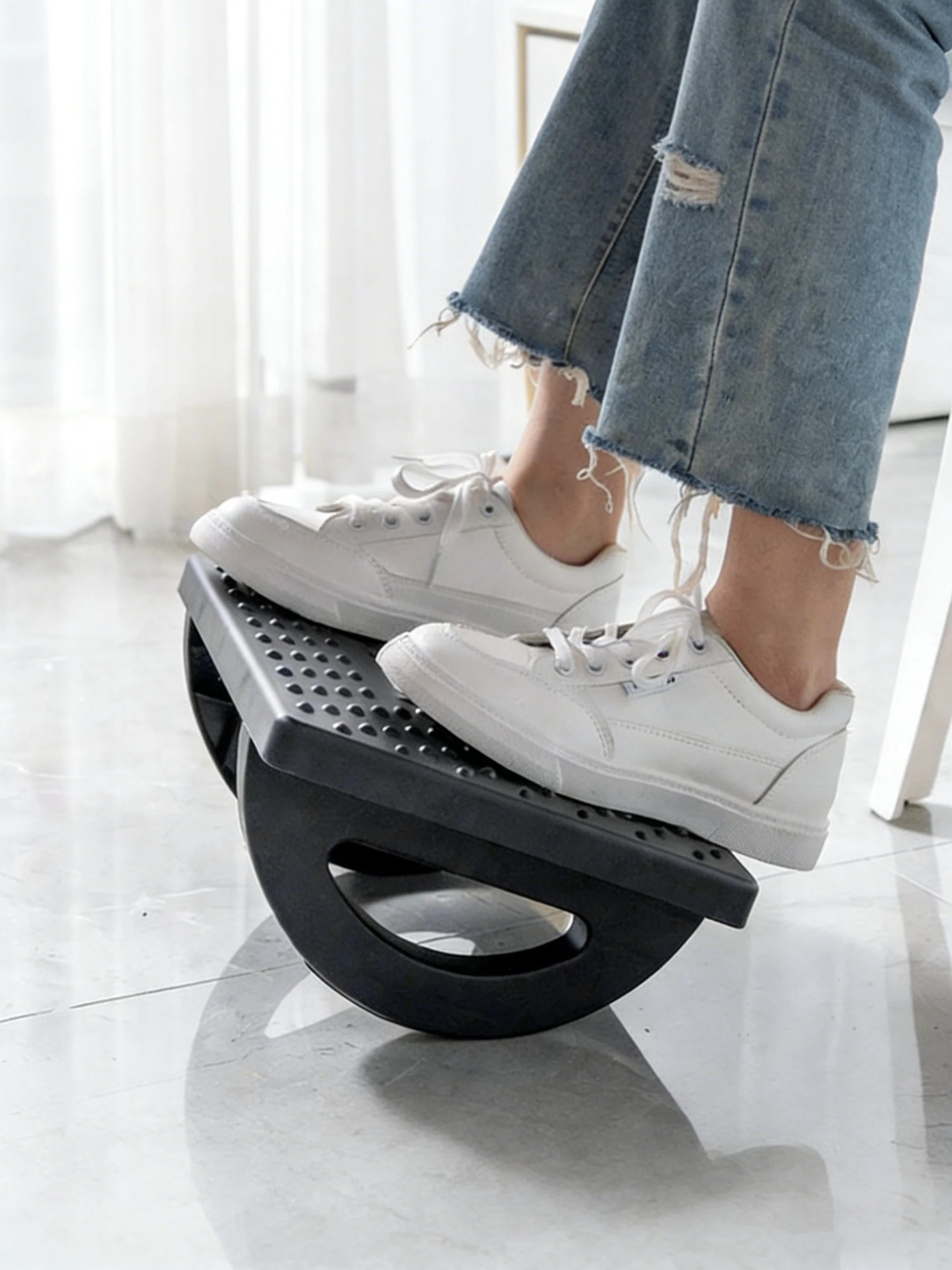 MobilityBuy.com portable under-desk foot rest with massage roller, black perforated platform
