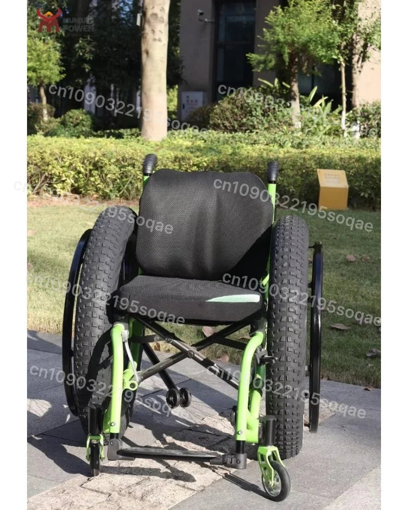 MobilityBuy.com Fat Tire Wheelchair Wheel 24 Inch x4.0; green frame, black seat, two wide tires