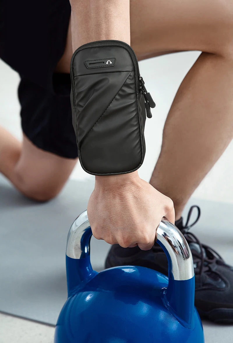 Lightweight zipper wrist wallet pouch by Aliexpress for phone, keys, and cards, featuring a compact design.